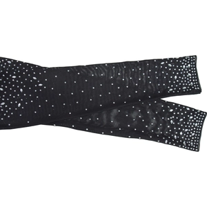 Detailed view of sheer black mesh sleeves featuring sparkling silver rhinestones
