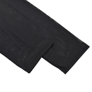 Detailed macro view of black mesh fabric with sheer texture and fine stitching for dress