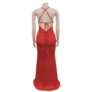 Detail of red backless ruched bodycon maxi dress with crisscross spaghetti straps