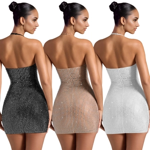 Rear view of backless bodycon mini dresses with rhinestones in black, white, and beige