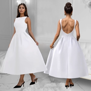 Front and back view of a white backless sleeveless A-line French style vintage maxi dress