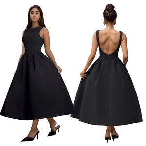 Detail of elegant backless black midi dress with pleated skirt and slim waistline
