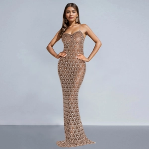 Detailed view of the diamond pattern rhinestones and beads on this evening dress
