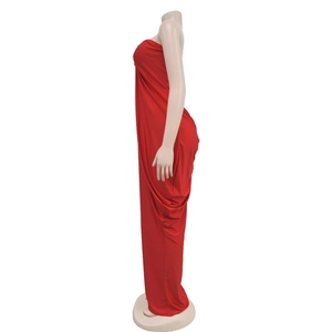 Detail view of red strapless floor-length dress showing side ruched fabric and slim fit