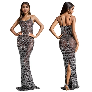 Detailed back view of a slim black spaghetti strap dress with silver rhinestone diamonds