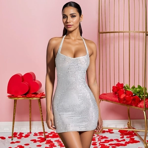 Detail of sequined halter neck dress with sparkling rhinestones and slim fit silhouette