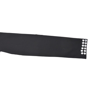 Close-up of black long sleeve cuff featuring two rows of sparkling white rhinestones