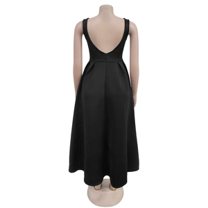 Detail of the backless V-shape design and invisible zipper on this black maxi dress