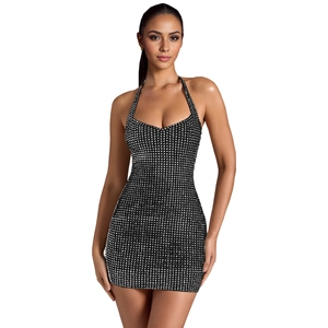Detailed close-up of a black bodycon halter dress featuring shimmering rhinestone grid patterns