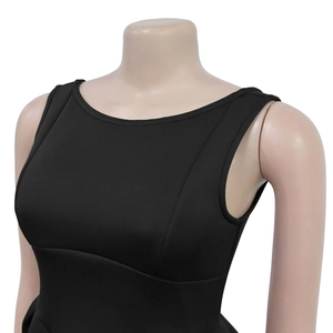 Close-up of the smooth neckline and armhole finishing on a black French retro maxi dress