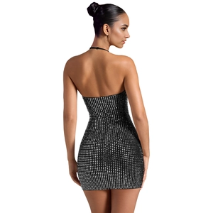 Close-up of black bodycon mini dress with shimmering silver sequins and backless halter design