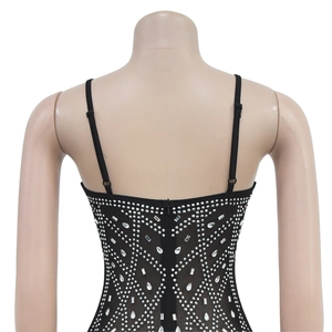 Detail of black rhinestone dress showing the invisible back zipper and silver sequins