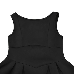 Detailed view of women's black sleeveless dress with V-shaped stitching and pleated skirt