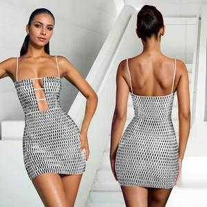 Detail of silver bodycon dress showing spaghetti straps and cut-out front with sequins