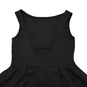 Detail of backless black French retro dress showing invisible zipper and pleated waistline