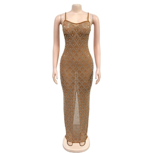 Close-up of brown bodycon dress featuring rhinestone argyle patterns and luxury details