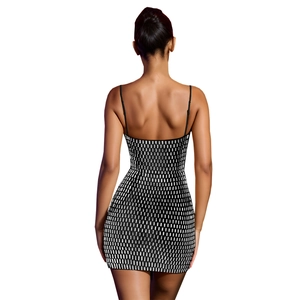 Detail of a slim-fit black mini dress showing thin straps and sparkly rhinestone pattern