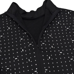 Detail of high collar black dress with silver rhinestones and invisible zipper