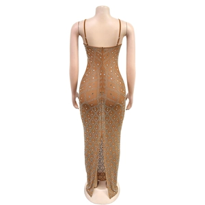 Detail of camel bodycon dress featuring shimmering silver rhinestones and a back slit