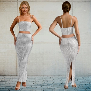 Detail of silver sequined two-piece set featuring a cropped top and long maxi skirt