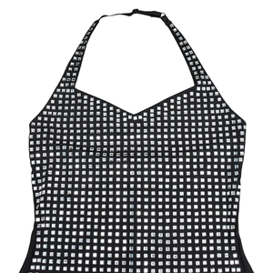 Detail of adjustable halter neck dress with sparkling silver rhinestone matrix patterns