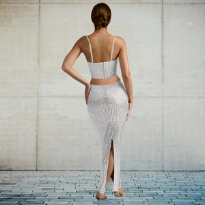 Macro view of silver sequin crop top and long skirt back split for women's fashion