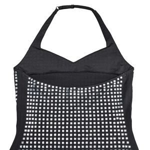 Close-up of black halter dress with shiny silver square rhinestones in a matrix pattern