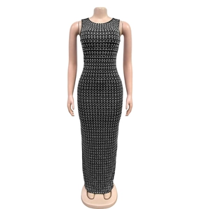 Detail of black bodycon dress with silver rhinestone wave pattern and sleek sleeveless cut