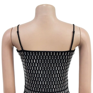 Detail of black rhinestone camisole with silver square gems in a matrix pattern