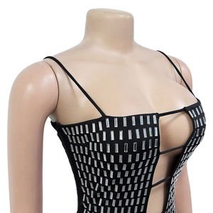 Detail of black rhinestone camisole with silver square sequins and plunging V neckline