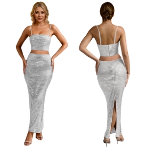Detail of silver sequined two-piece set featuring cropped camisole and back-slit maxi skirt