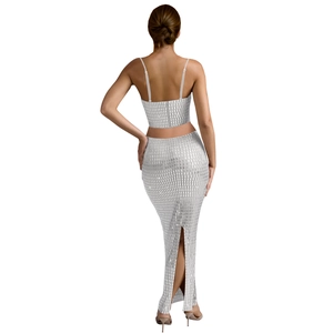 Silver sequin two-piece set featuring cropped camisole and maxi skirt with back slit