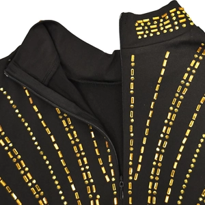 Close-up of gold rhinestones and invisible zipper on the high neck back of a black dress