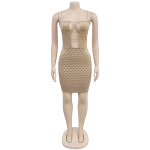 Detail of nude bodycon mini dress with silver sequins and deep V-neck cutout design