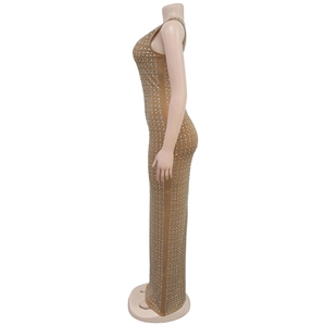 Detailed side view of camel bodycon dress with silver rhinestones and high slit