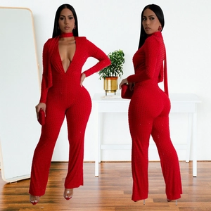 Sparkling red rhinestone jumpsuit with deep V-neck and long sleeves for elegant evening party
