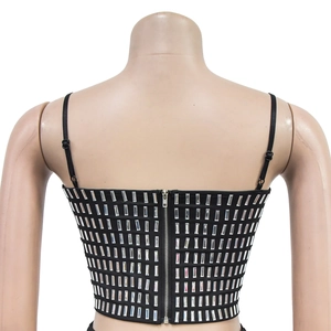 Detail of black crop top back with sparkling silver rhinestones and adjustable straps