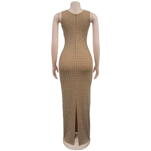 Detail view of khaki bodycon dress featuring silver rhinestones and back slit on mannequin