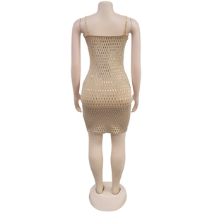 Close-up back view of a slim bodycon mini dress featuring silver sequins and thin straps