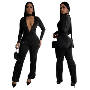 Front and back view of a black deep V-neck rhinestone jumpsuit with matching choker accessory