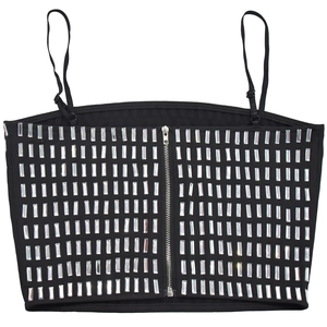 Detail of black camisole featuring silver metal zipper and rectangular rhinestones