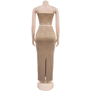 Detail view of khaki two-piece set featuring silver sequins and back zipper closure