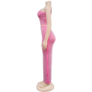 Detail of pink two-piece set featuring vertical silver sequins and a high-waisted fit