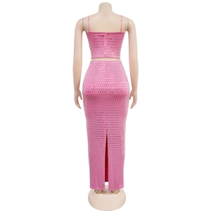 Detail of pink two-piece set featuring silver sequins and a metallic back zipper