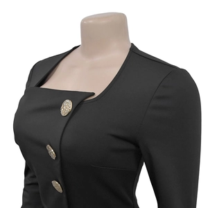 Detail of square neckline with gold embossed buttons on a slim-fit black formal jumpsuit