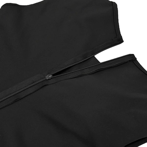 Detailed close-up of smooth nylon zipper and stitching on black long sleeve bodysuit