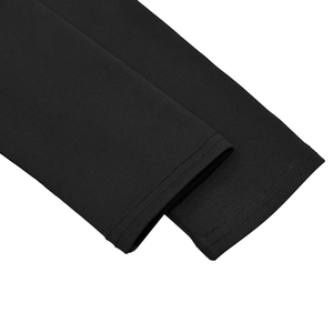 Detail of double-needle stitching on black elastic sleeve cuffs of a slim bodysuit