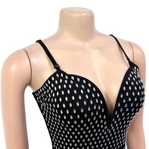 Detail of black V-neck bodycon dress with sparkling silver rhinestones and adjustable straps