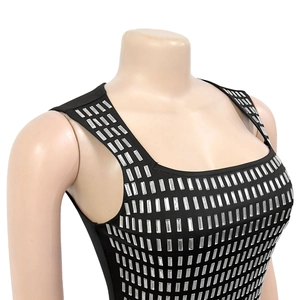 Close-up of silver rectangular rhinestones on black bodycon dress fabric texture