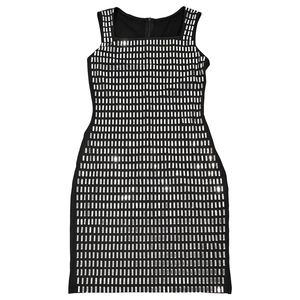 Close-up of black bodycon dress with silver rectangular sequins in a grid pattern